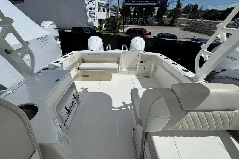 Slide: The Image of 2026 World Cat 280 DC-X boat interior with seating and storage, showcasing modern design. - 12