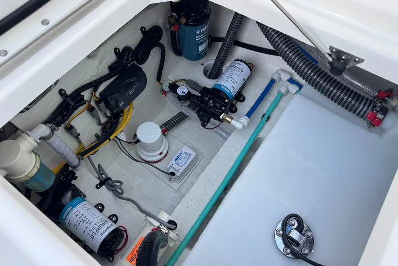 Slide: The Image of Interior view of 2026 World Cat 280 DC-X boat's mechanical compartment. - 16