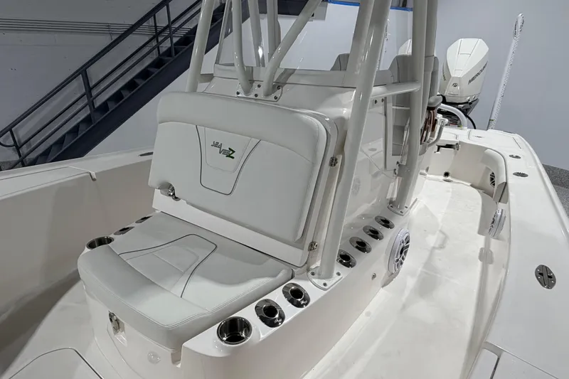 Slide: The Image of 2025 SeaVee 270Z boat interior with seating and cup holders. - 35