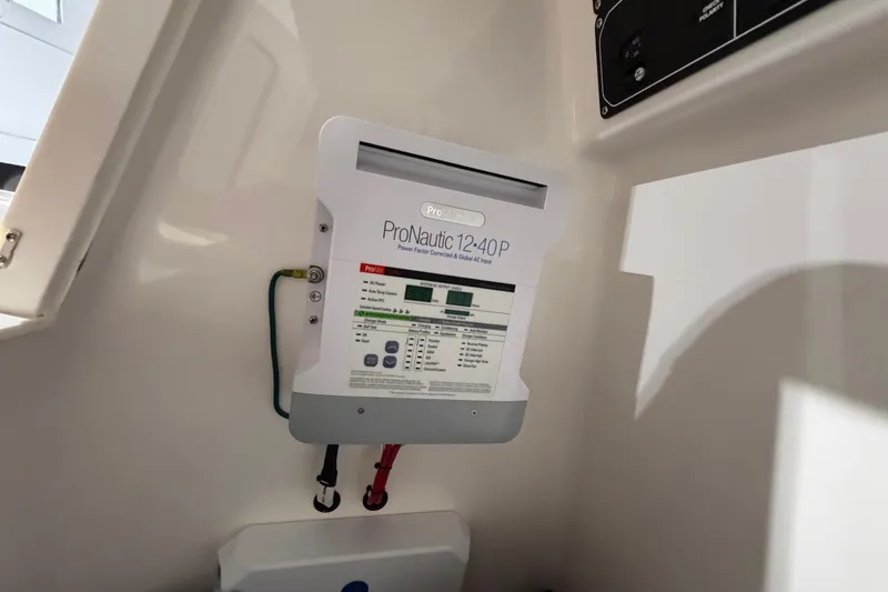 Slide: The Image of ProNautic 12:40P charger installed on 2025 SeaVee 270Z boat interior. - 42