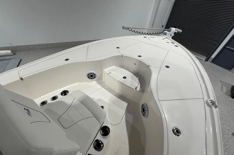 Slide: The Image of 2025 SeaVee 270Z boat interior with seating and speakers, showcasing modern design and functionality. - 43