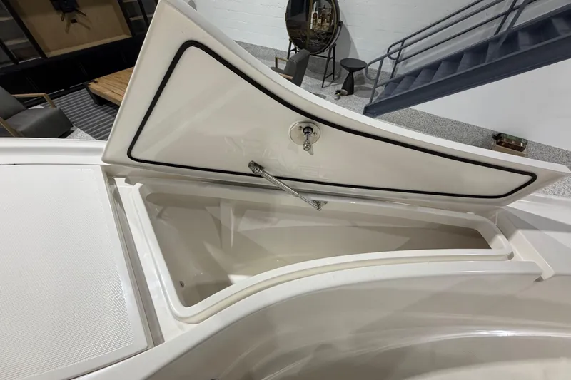 Slide: The Image of Open storage compartment on 2025 SeaVee 270Z boat, showcasing interior space and design. - 46