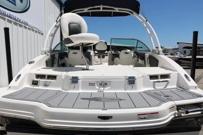 Slide: The Image of 2023 Chaparral 21 SSi Ski & Fish boat with sleek design and spacious seating. - 10