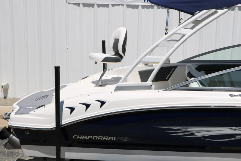 Slide: The Image of 2023 Chaparral 21 SSi Ski & Fish boat with sleek design and comfortable seating. - 17