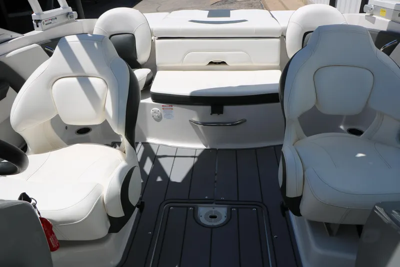 Slide: The Image of 2023 Chaparral 21 SSi Ski & Fish boat interior with white seating and modern design. - 37