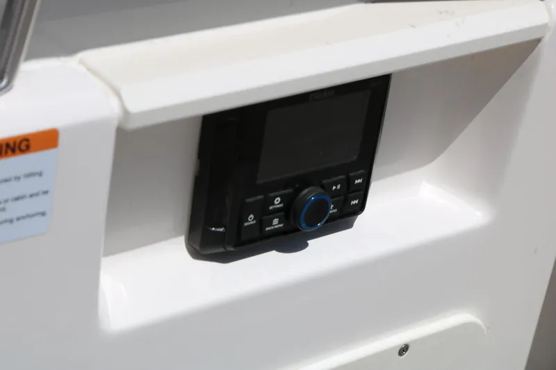 Slide: The Image of Control panel on 2023 Chaparral 21 SSi Ski & Fish boat dashboard. - 42