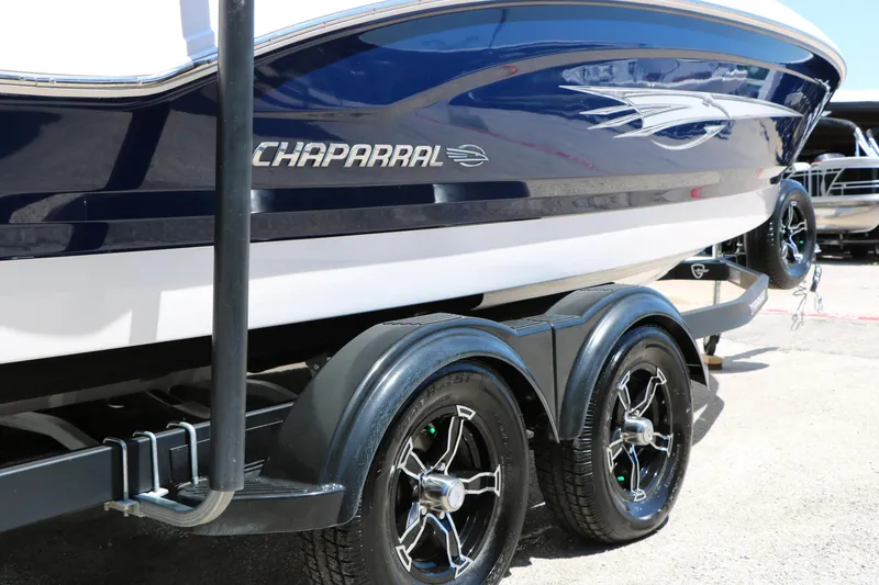 Slide: The Image of 2023 Chaparral 21 SSi Ski & Fish boat on trailer, side view. - 8