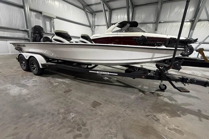 The Image of 2020 Vexus AVX 2080 boat on trailer in indoor storage facility. - 0