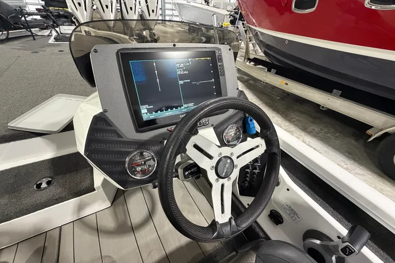 Slide: The Image of 2020 Vexus AVX 2080 boat dashboard with steering wheel and digital display. - 17