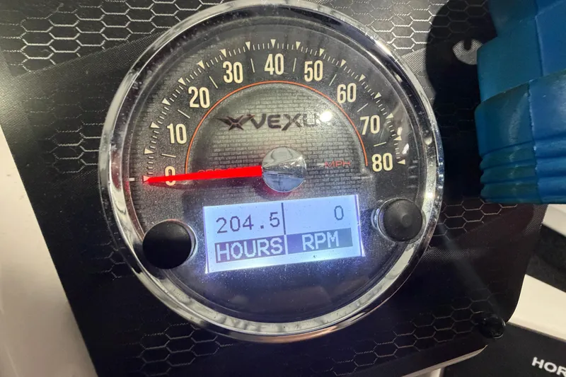 Slide: The Image of Vexus AVX 2080 2020 speedometer showing 204.5 hours and 0 RPM. - 19