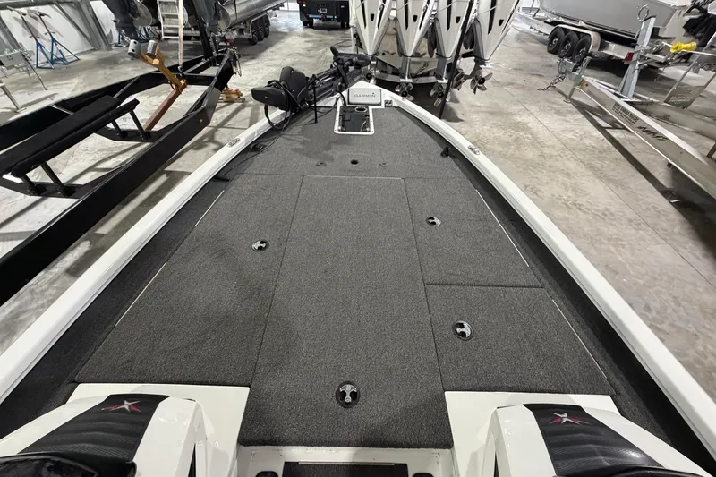 Slide: The Image of 2020 Vexus AVX 2080 boat interior with carpeted deck in a showroom. - 20