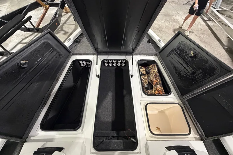 Slide: The Image of 2020 Vexus AVX 2080 boat storage compartments open, showcasing interior layout. - 21