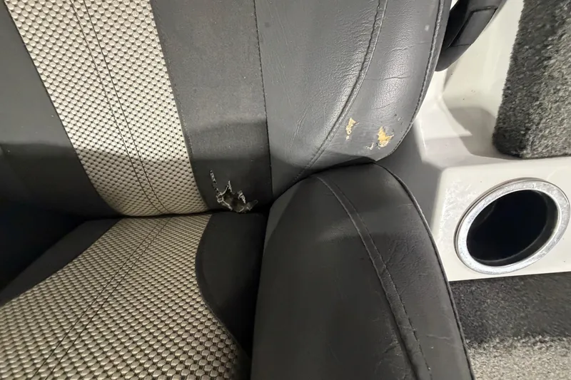 Slide: The Image of 2020 Vexus AVX 2080 boat seat with visible wear and tear. - 24