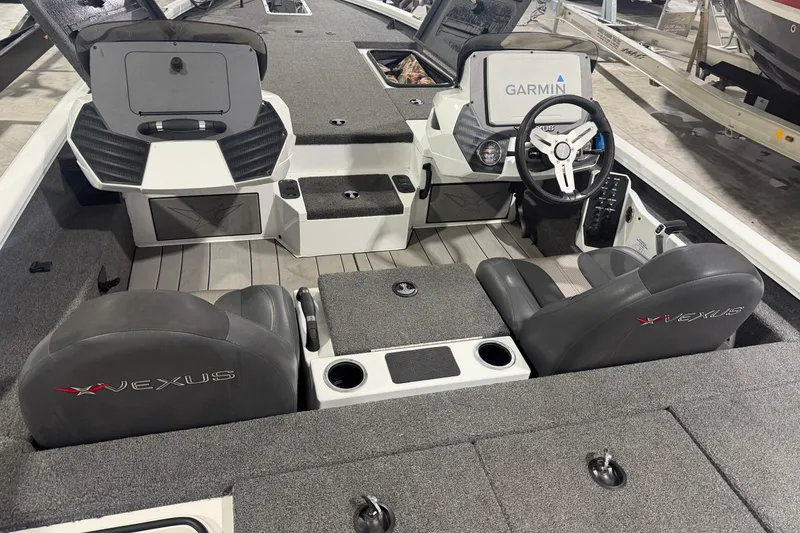Slide: The Image of 2020 Vexus AVX 2080 boat interior with Garmin electronics and dual seating. - 29