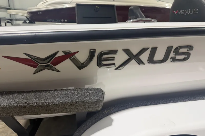 Slide: The Image of 2020 Vexus AVX 2080 boat logo on white hull, showcasing sleek design. - 30
