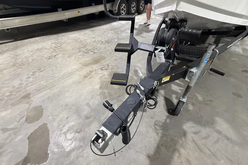 Slide: The Image of Trailer hitch of a 2020 Vexus AVX 2080 boat in a garage setting. - 4