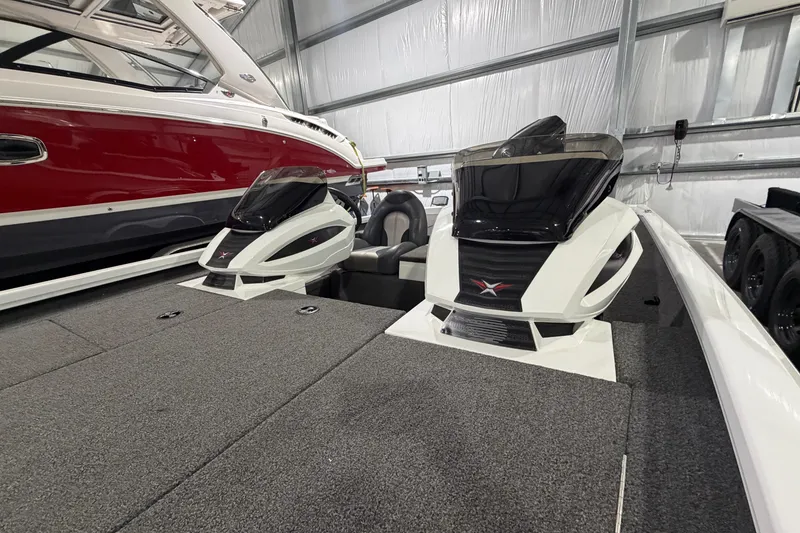 Slide: The Image of 2020 Vexus AVX 2080 boat with dual engines in a storage facility. - 7