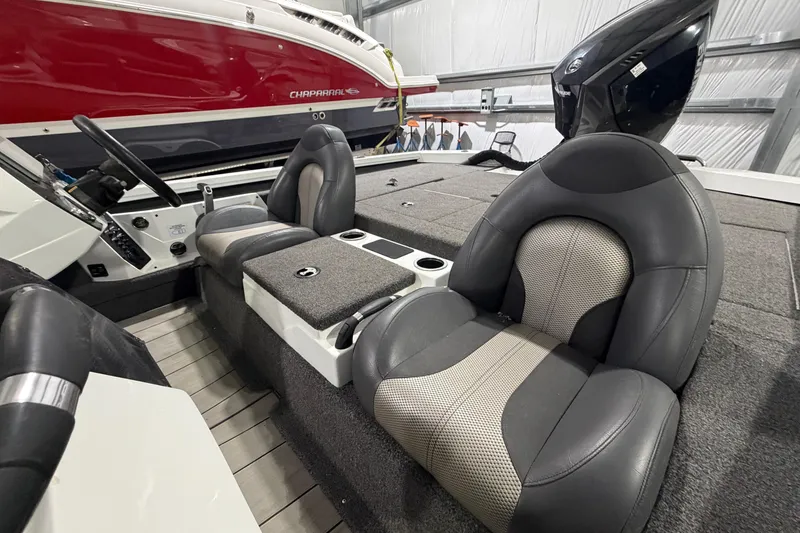 Slide: The Image of 2020 Vexus AVX 2080 boat interior with dual seats and steering wheel in a showroom. - 8