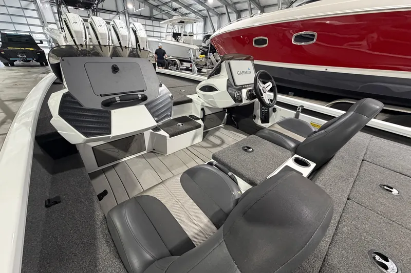 Slide: The Image of 2020 Vexus AVX 2080 boat interior with Garmin system in a showroom. - 9