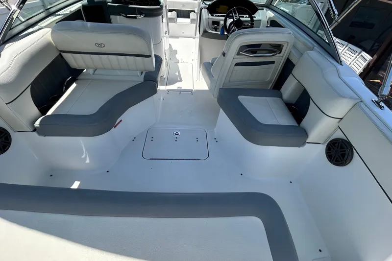 Slide: The Image of 2020 Cobalt 23SC boat interior with spacious seating and modern design. - 24