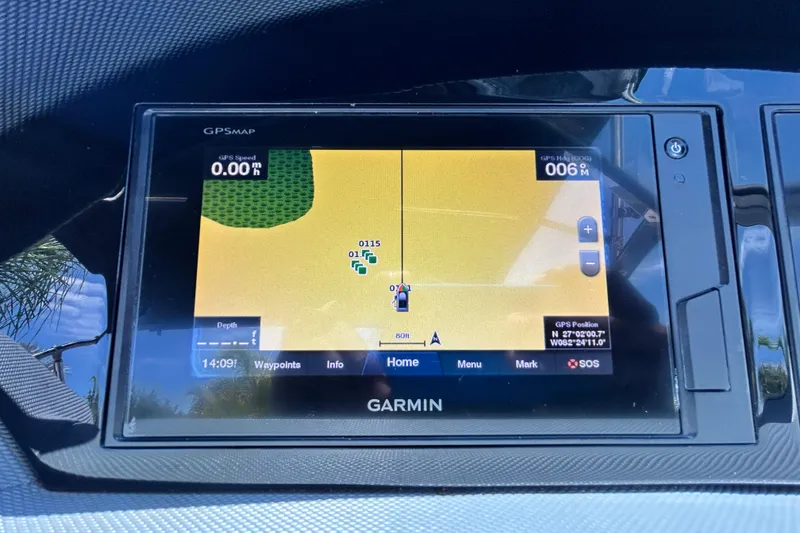 Slide: The Image of Garmin GPS display on 2020 Cobalt 23SC boat, showing navigation map and coordinates. - 43