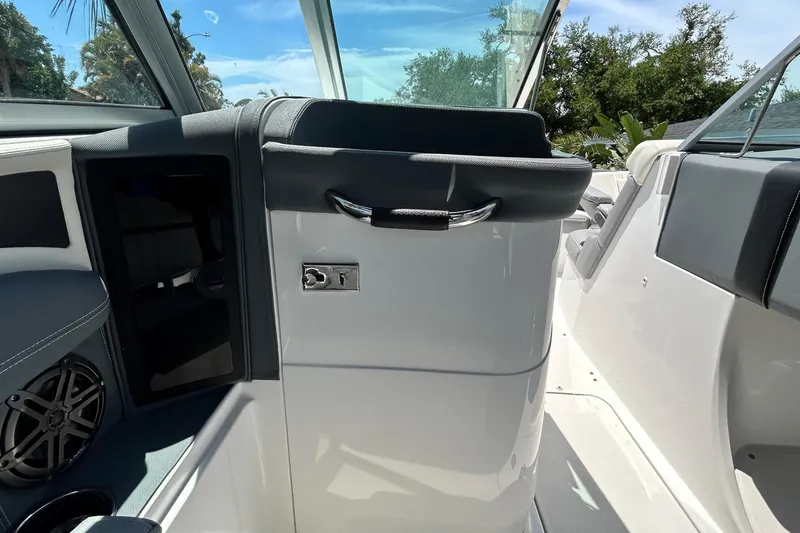 Slide: The Image of Interior view of a 2020 Cobalt 23SC boat, featuring sleek seating and modern design. - 51