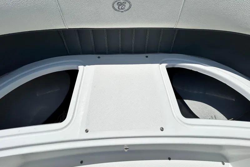Slide: The Image of 2020 Cobalt 23SC boat interior with sleek white and gray upholstery design. - 67