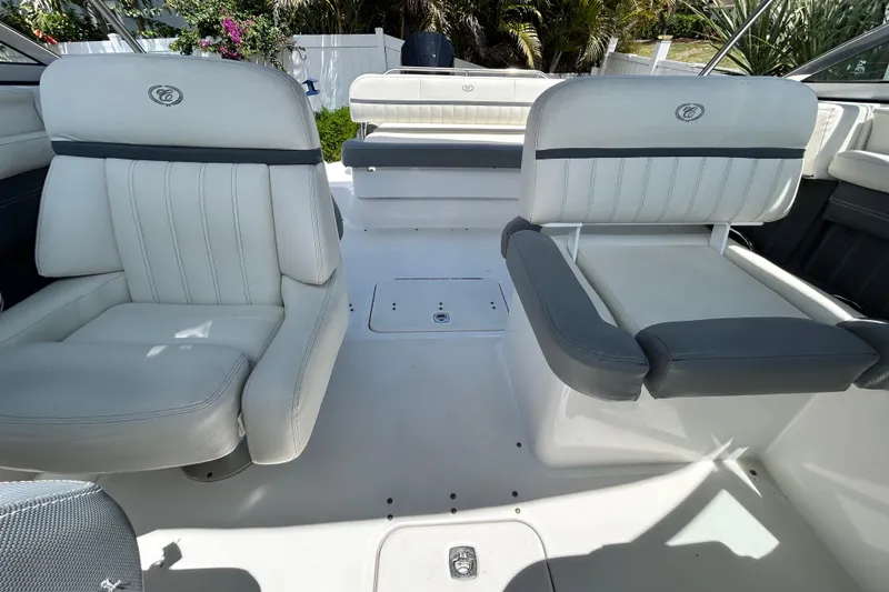 Slide: The Image of Interior of 2020 Cobalt 23SC boat with white and gray seating. - 85