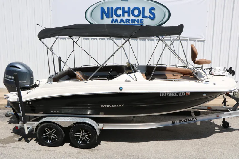 Slide: The Image of 2020 Stingray 192 SC boat with Yamaha engine on trailer at Nichols Marine. - 17