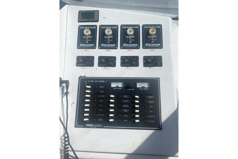 Slide: The Image of Control panel of a 2003 Gold Coast fast ferry with high water alarms and switches. - 17