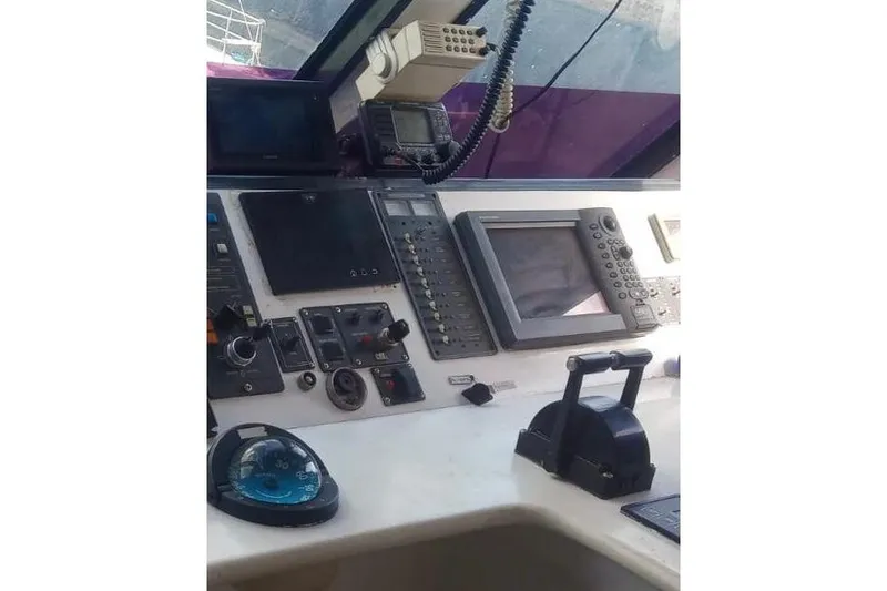 Slide: The Image of Control panel of a 2003 Gold Coast fast ferry, featuring navigation and communication equipment. - 21