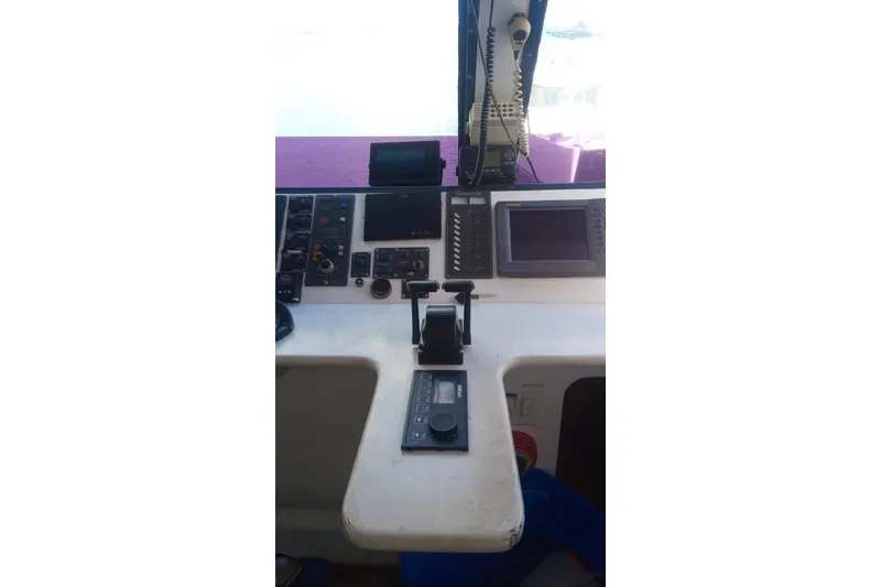 Slide: The Image of Control panel of a 2003 Gold Coast fast ferry with navigation equipment. - 22