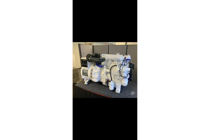 Slide: The Image of Engine of a 2003 Gold Coast fast ferry displayed indoors. - 28