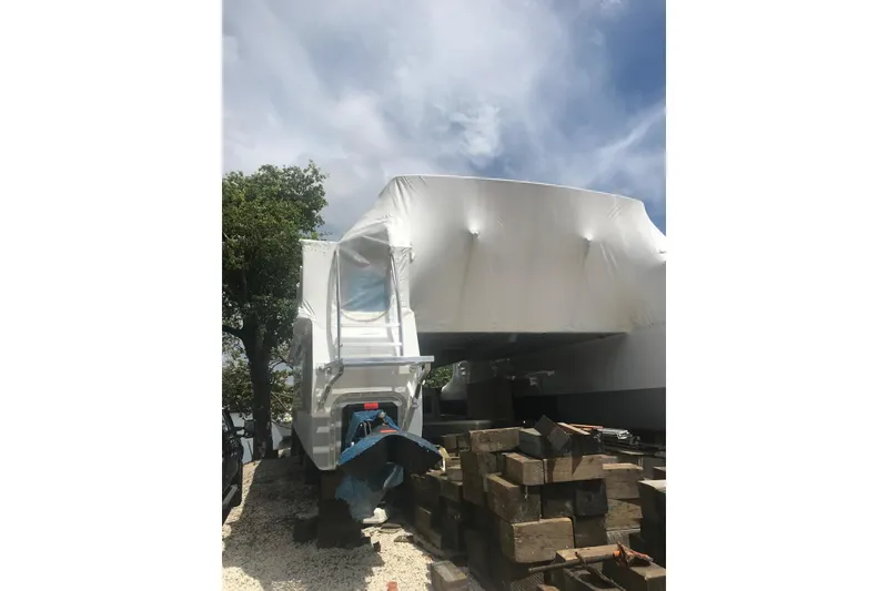 Slide: The Image of Covered 2003 Gold Coast fast ferry on land, surrounded by wooden blocks. - 31