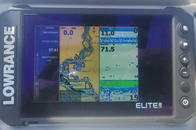 Slide: The Image of Lowrance Elite FS7 marine GPS display showing navigation and sonar data on a South Bay 525UL AR, 2023. - 20