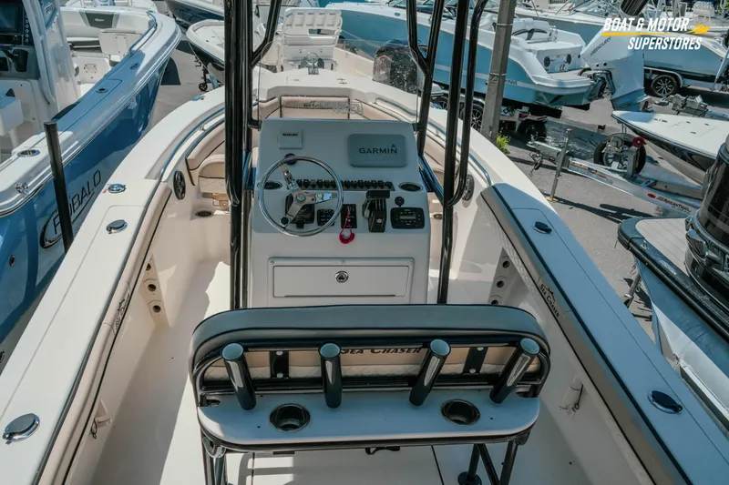 Slide: The Image of 2020 Sea Chaser 22 HFC boat interior with steering console and seating. - 12
