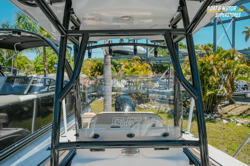 Slide: The Image of 2020 Sea Chaser 22 HFC boat interior with clear windshield and sturdy frame. - 21