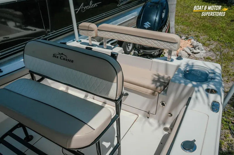 Slide: The Image of 2020 Sea Chaser 22 HFC boat interior with seating and motor, at Boat & Motor Superstores. - 24