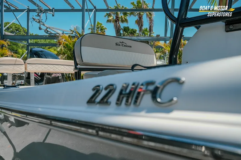 Slide: The Image of 2020 Sea Chaser 22 HFC boat with sleek design, showcased at Boat & Motor Superstores. - 5