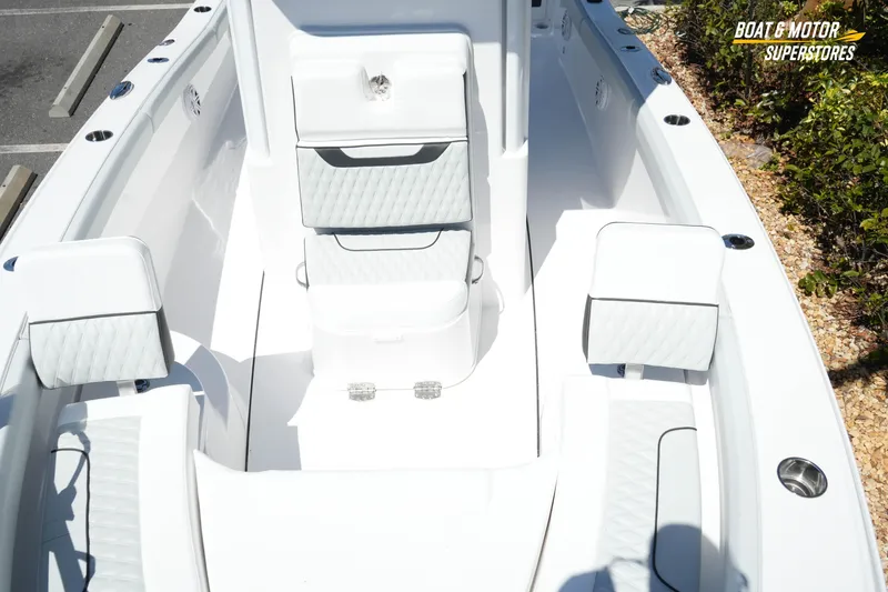 Slide: The Image of 2026 Blackfin 242 HB boat interior with white seating and modern design. - 22