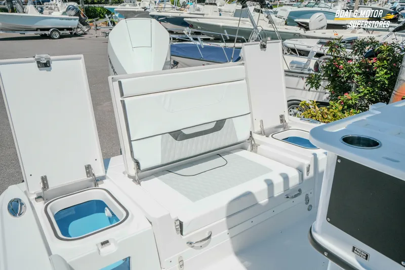 Slide: The Image of 2026 Blackfin 242 HB boat interior with seating and storage compartments. - 29