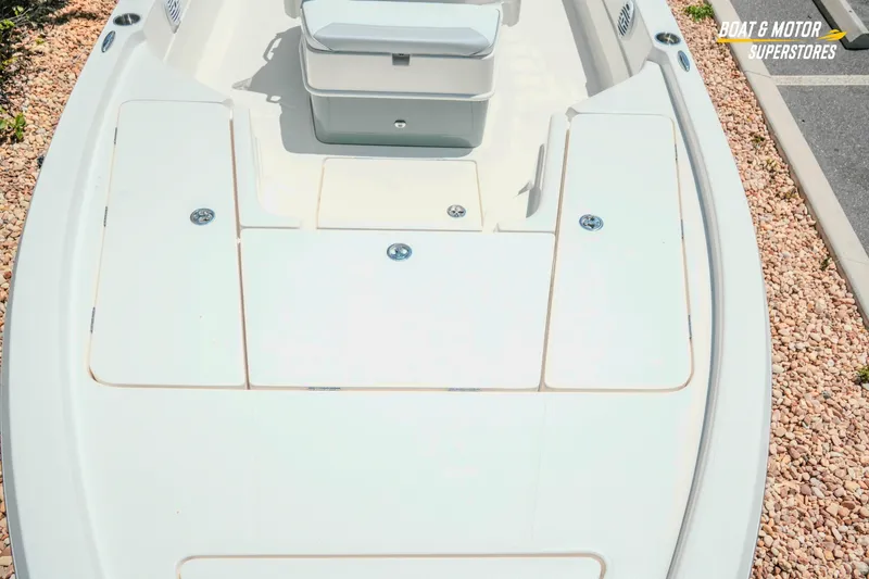 Slide: The Image of 2026 Skeeter SX221 boat deck with storage compartments, showcased at Boat & Motor Superstores. - 21