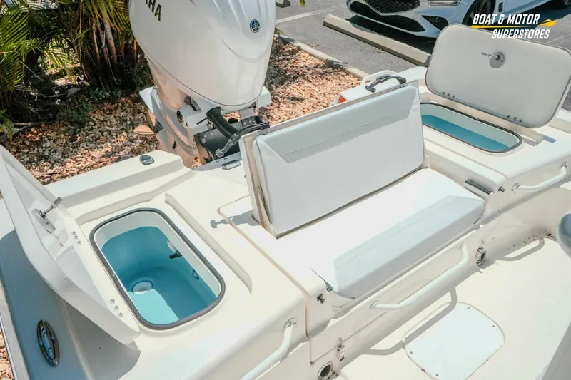 Slide: The Image of 2026 Skeeter SX221 boat interior with seating and storage compartments. - 27