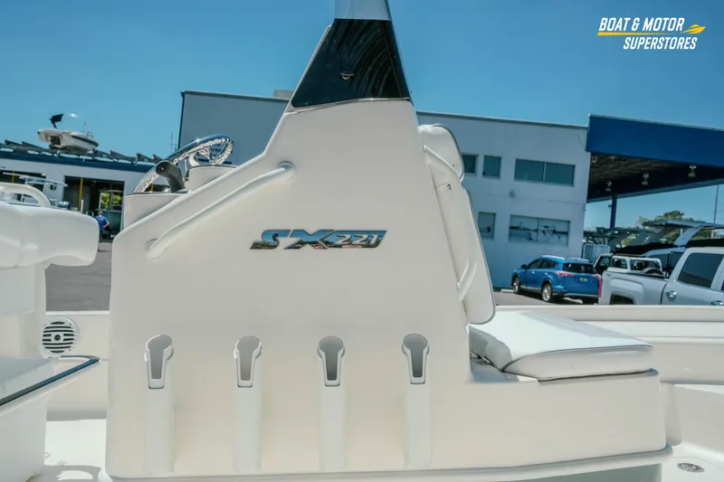 Slide: The Image of 2026 Skeeter SX221 boat console with logo, displayed at Boat & Motor Superstores. - 7