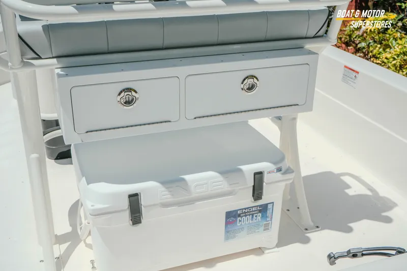Slide: The Image of 2026 Skeeter SX221 boat interior with Engel cooler and storage drawers. - 12