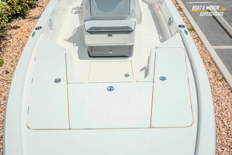 Slide: The Image of 2026 Skeeter SX221 boat deck with seating and storage compartments. - 20