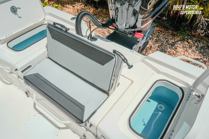 Slide: The Image of 2026 Skeeter SX221 boat interior with seating and storage compartments. - 27