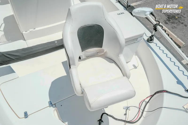 Slide: The Image of 2016 Boston Whaler 210 Montauk boat seat with fishing equipment and storage. - 19