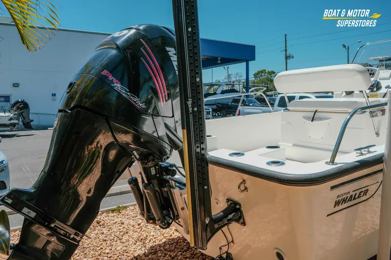 Slide: The Image of 2016 Boston Whaler 210 Montauk boat with Mercury Pro XS outboard motor at dealership. - 8