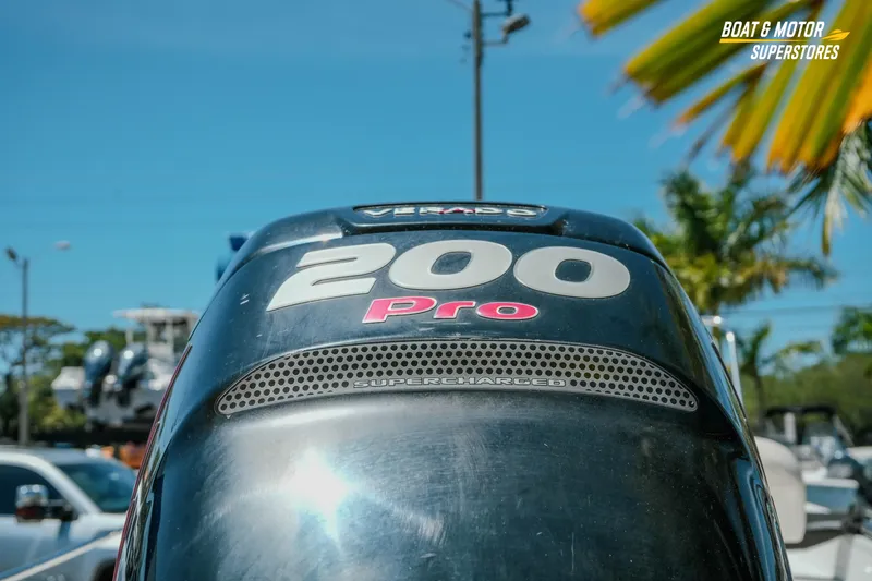 Slide: The Image of Outboard motor on a 2016 Boston Whaler 210 Montauk, featuring "200 Pro" branding. - 9